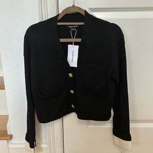 Black and white cropped cardigan with gold buttons